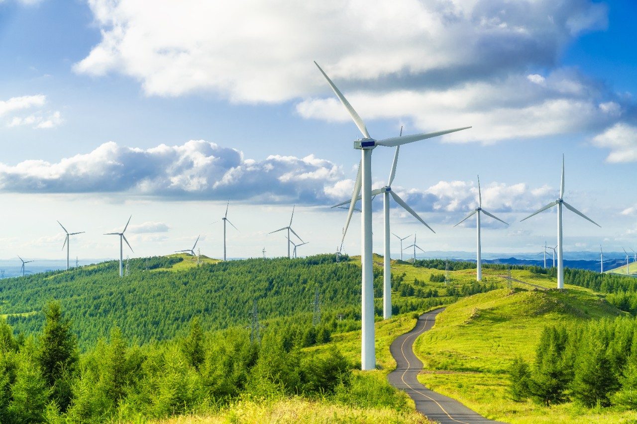 Wind turbines with blue sky background